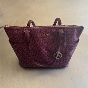 Michael Kors Plum Handbag with Gold Accents